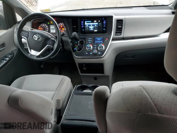 2016 Toyota Sienna LE with VIN 5TDJK3DC4GS133341, listed as a Copart auction lot 83660134 with 133,700 mi miles and Salvage Title. Bid and sale history available at carsss.com. Image 8.