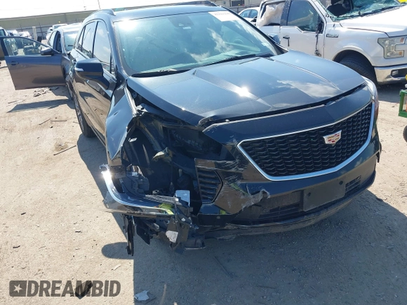 2019 Cadillac XT4 FWD Sport with VIN 1GYFZER46KF125100, listed as a IAAI auction lot 42221290 with 79,491 mi miles and . Bid and sale history available at DreamBid. Image 1.