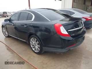 2013 Lincoln MKS EcoBoost with VIN 1LNHL9FT2DG604724, listed as a IAAI auction lot 41428420 with 152,880 mi miles and . Bid and sale history available at DreamBid. Image 3.