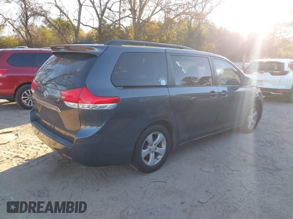 2011 Toyota Sienna LE AAS with VIN 5TDKK3DC2BS070656, listed as a IAAI auction lot 41034261 with 259,239 mi miles. Bid and sale history available at carsss.com. Image 4.