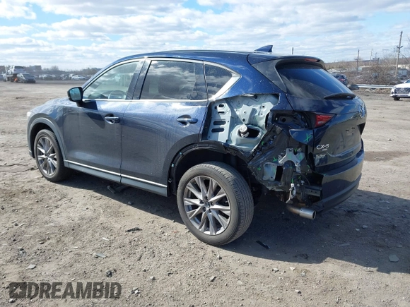 2020 Mazda CX-5 Grand Touring with VIN JM3KFBDM2L0768770, listed as a IAAI auction lot 41695058 with 44,192 mi miles. Bid and sale history available at carsss.com. Image 3.