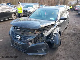 2018 Nissan Altima 2.5 SV with VIN 1N4AL3AP6JC244153, listed as a IAAI auction lot 41658699 with 54,486 mi miles. Bid and sale history available at carsss.com. Image 6.