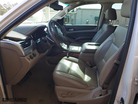 2020 Chevrolet Suburban Premier with VIN 1GNSKJKC0LR276184, listed as a Copart auction lot 88840565 with 87,563 mi miles and Salvage Title. Bid and sale history available at carsss.com. Image 7.