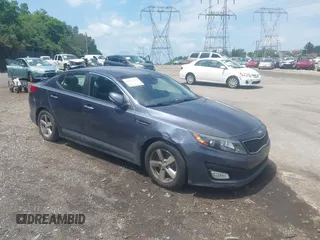 2015 Kia Optima LX with VIN 5XXGM4A7XFG477516, listed as a IAAI auction lot 42671135 with 160,680 mi miles and . Bid and sale history available at DreamBid. Image 1.