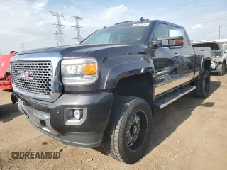 2016 GMC Sierra 2500HD Denali z VIN 1GT12UE85GF156403, wystawiony jako Copart lot #54322915 z przebiegiem 138 429 mil mil oraz Szkoda całkowita • Salvage title. Historia ofert i sprzedaży dostępna na DreamBid. Obrazek 1.