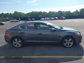 2014 Acura ILX z VIN 19VDE1F39EE002881, wystawiony jako IAAI lot #42270605 z przebiegiem 172 356 mil mil oraz . Historia ofert i sprzedaży dostępna na DreamBid. Obrazek 13.