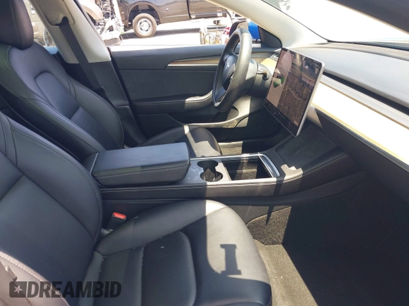 2022 Tesla Model 3 Long Range z VIN 5YJ3E1EB6NF106038, wystawiony jako IAAI lot #42214585 z przebiegiem 40 667 mil mil oraz . Historia ofert i sprzedaży dostępna na DreamBid. Obrazek 5.