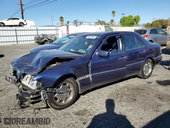 1996 Mercedes-Benz C with VIN WDBHA28E5TF406948, listed as a Copart auction lot 80234944 with 239,256 mi miles and Salvage Title. Bid and sale history available at carsss.com. Image 1.