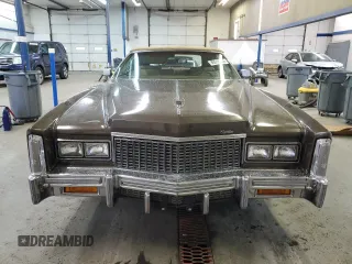 1976 Cadillac Eldorado z VIN 6L67S6Q235270, wystawiony jako Copart lot #80518554 z przebiegiem 4 944 mil mil oraz Szkoda całkowita • Salvage title. Historia ofert i sprzedaży dostępna na DreamBid. Obrazek 5.