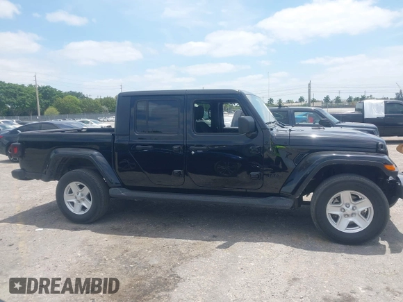 2022 Jeep Gladiator Willys Sport z VIN 1C6HJTAG7NL161701, wystawiony jako IAAI lot #42097144 z przebiegiem 32 989 mil mil oraz . Historia ofert i sprzedaży dostępna na DreamBid. Obrazek 14.