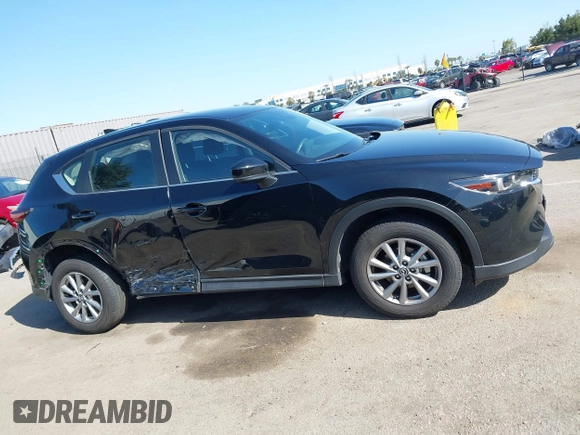 2023 Mazda CX-5 2.5 S with VIN JM3KFBAM5P0291312, listed as a IAAI auction lot 41957929 with 19,000 mi miles. Bid and sale history available at carsss.com. Image 14.