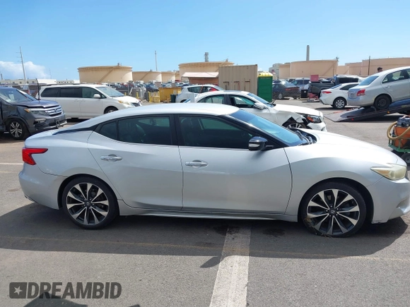 2016 Nissan Maxima SV with VIN 1N4AA6AP5GC395274, listed as a IAAI auction lot 41616698 with 102,736 mi miles and . Bid and sale history available at DreamBid. Image 13.