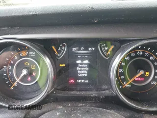 2021 Jeep Wrangler Sport S with VIN 1C4GJXAN9MW768559, listed as a IAAI auction lot 41238254 with 18,191 mi miles and . Bid and sale history available at DreamBid. Image 7.