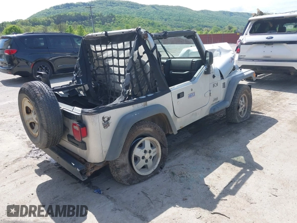 2006 Jeep Wrangler X with VIN 1J4FA39S36P703941, listed as a IAAI auction lot 42220361 with 148,829 mi miles and . Bid and sale history available at DreamBid. Image 4.