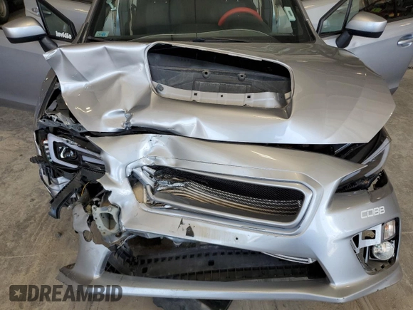 2016 Subaru WRX Premium z VIN JF1VA1E69G9828081, wystawiony jako Copart lot #63122085 z przebiegiem 52 984 mil mil oraz Szkoda całkowita • Salvage title. Historia ofert i sprzedaży dostępna na DreamBid. Obrazek 11.