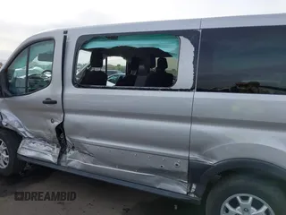 2015 Ford Transit XL z VIN 1FMZK1YMXFKA97523, wystawiony jako IAAI lot #40971108 z przebiegiem 253 712 mil mil oraz . Historia ofert i sprzedaży dostępna na DreamBid. Obrazek 14.