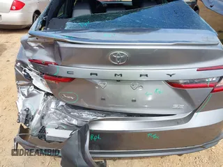 2025 Toyota Camry LE with VIN 4T1DAACK6SU510894, listed as a IAAI auction lot 42048585 with 12,601 mi miles and . Bid and sale history available at DreamBid. Image 6.