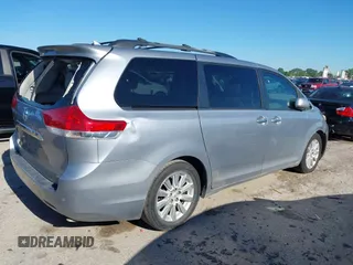 2011 Toyota Sienna XLE AAS with VIN 5TDYK3DC0BS056197, listed as a IAAI auction lot 41771073 with 195,022 mi miles and . Bid and sale history available at DreamBid. Image 4.