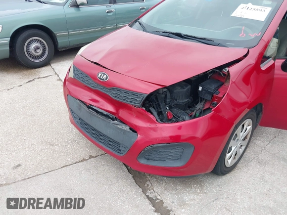 2015 Kia Rio LX with VIN KNADM5A34F6517123, listed as a IAAI auction lot 42125593 with 138,214 mi miles. Bid and sale history available at carsss.com. Image 6.