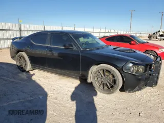 2007 Dodge Charger SRT-8 with VIN 2B3KA73WX7H709265, listed as a Copart auction lot 78547114 with 82,130 mi miles and Salvage Title. Bid and sale history available at DreamBid. Image 4.