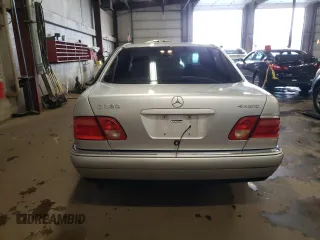 1999 Mercedes-Benz E-Class with VIN WDBJF82H4XX021888, listed as a Copart auction lot 83069274 with 173,198 mi miles and Salvage Title. Bid and sale history available at carsss.com. Image 6.
