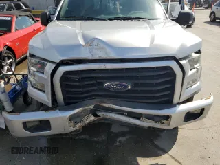 2015 Ford F-150 XLT с VIN 1FTEW1EF1FKE33685, выставлен на аукционе Copart как лот 57180675 с пробегом Не указан миль и Списание • Salvage title. История ставок и продаж доступна на DreamBid. Изображение 11.