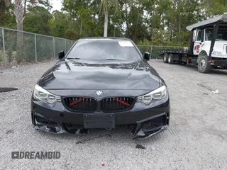 2015 BMW 4 Series 435i with VIN WBA4B1C5XFD955119, listed as a IAAI auction lot 41349918 with 181,937 mi miles and . Bid and sale history available at carsss.com. Image 13.