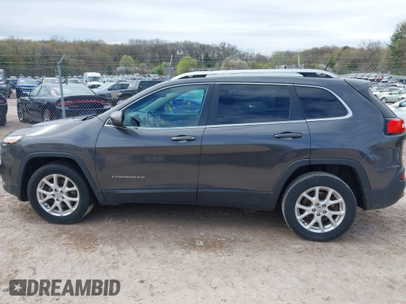 2015 Jeep Cherokee Latitude with VIN 1C4PJLCS9FW542181, listed as a IAAI auction lot 42183167 with 144,607 mi miles and . Bid and sale history available at carsss.com. Image 14.