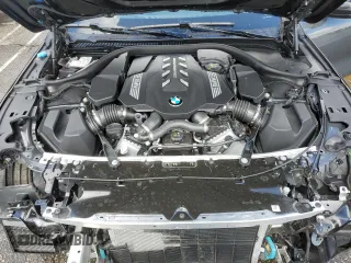2025 BMW 8 Series M850i with VIN WBAGV8C07SCT18237, listed as a Copart auction lot 49277375 with 750 mi miles and Salvage title. Bid and sale history available at DreamBid. Image 11.