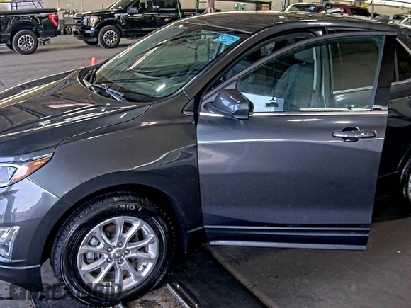 2020 Chevrolet Equinox LT z VIN 2GNAXJEV5L6232400, wystawiony jako IAAI lot #42575814 z przebiegiem 110 520 mil mil oraz . Historia ofert i sprzedaży dostępna na DreamBid. Obrazek 24.
