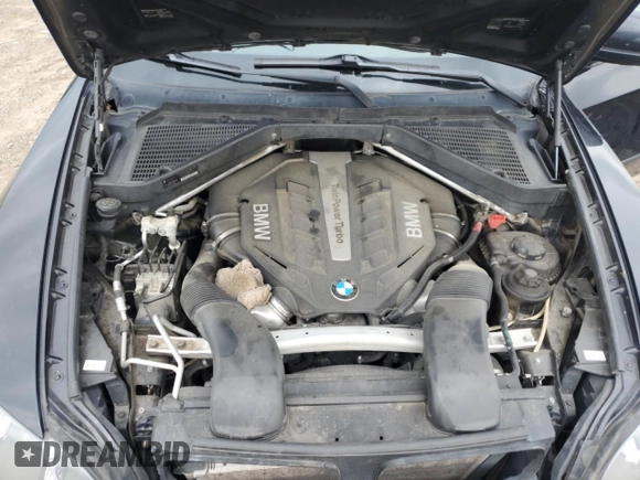 2013 BMW X5 xDrive50i z VIN 5UXZV8C53DL898918, wystawiony jako Copart lot #57604905 z przebiegiem 158 038 mil mil oraz Czysty tytuł • Clean title. Historia ofert i sprzedaży dostępna na DreamBid. Obrazek 12.