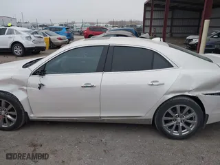 2013 Chevrolet Malibu LTZ with VIN 1G11H5SA7DF127467, listed as a IAAI auction lot 41192477 with 138,344 mi miles. Bid and sale history available at carsss.com. Image 14.