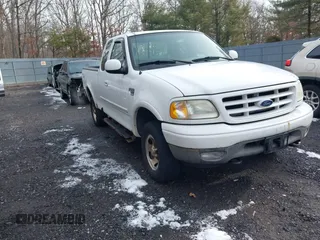 2003 Ford F-150 XL with VIN 1FTRX18W43NB84285, listed as a IAAI auction lot 41494919 with 197,352 mi miles. Bid and sale history available at carsss.com. Image 1.