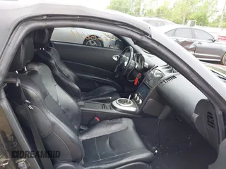2006 Nissan 350Z Touring z VIN JN1AZ36A76M456514, wystawiony jako IAAI lot #42266616 z przebiegiem 129 729 mil mil oraz . Historia ofert i sprzedaży dostępna na DreamBid. Obrazek 5.