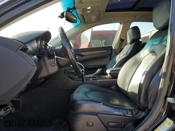 2009 Cadillac CTS AWD w/1SB with VIN 1G6DT57V790104976, listed as a Copart auction lot 76904004 with 144,300 mi miles and Salvage Title. Bid and sale history available at carsss.com. Image 7.
