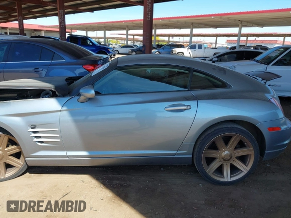2004 Chrysler Crossfire z VIN 1C3AN69L44X017780, wystawiony jako IAAI lot #42164946 z przebiegiem Nie podano mil oraz . Historia ofert i sprzedaży dostępna na DreamBid. Obrazek 13.