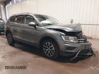 2021 Volkswagen Tiguan SE z VIN 3VV3B7AX3MM118463, wystawiony jako IAAI lot #42138702 z przebiegiem 48 058 mil mil oraz . Historia ofert i sprzedaży dostępna na DreamBid. Obrazek 1.