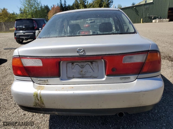1998 Mazda Protege DX with VIN JM1BC1417W0226912, listed as a Copart auction lot 53711875 with 210,374 mi miles and Clean Title. Bid and sale history available at carsss.com. Image 6.