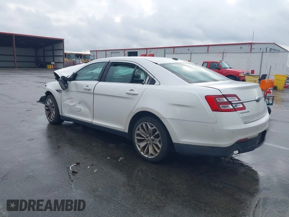 2014 Ford Taurus Limited with VIN 1FAHP2F80EG183153, listed as a IAAI auction lot 40860378 with 163,294 mi miles. Bid and sale history available at carsss.com. Image 3.