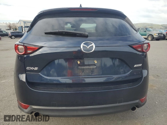 2018 Mazda CX-5 Grand Touring with VIN JM3KFADM7J0380568, listed as a Copart auction lot 48749015 with 53,401 mi miles and Salvage Title. Bid and sale history available at carsss.com. Image 6.