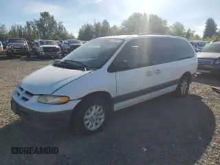 2000 Dodge Caravan SE with VIN 1B4GP44L3YB734876, listed as a Copart auction lot 72469374 with 215,240 mi miles and Salvage Title. Bid and sale history available at carsss.com. Image 1.