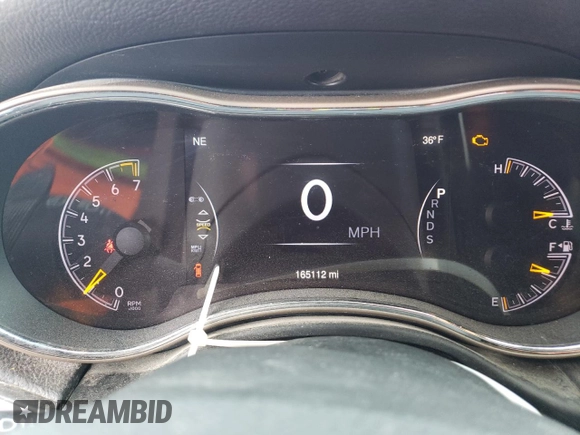 2014 Jeep Grand Cherokee Laredo with VIN 1C4RJFAG2EC415331, listed as a Copart auction lot 86904504 with 165,112 mi miles and Salvage Title. Bid and sale history available at carsss.com. Image 9.
