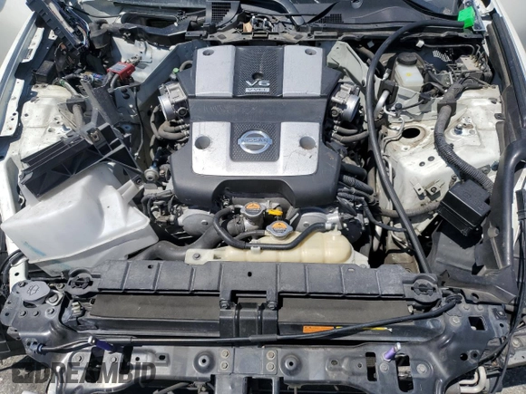 2012 Nissan 370Z z VIN JN1AZ4EH1CM562134, wystawiony jako Copart lot #56708065 z przebiegiem Nie podano mil oraz Szkoda całkowita • Salvage title. Historia ofert i sprzedaży dostępna na DreamBid. Obrazek 11.