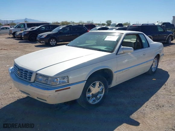 1999 Cadillac Eldorado ESC with VIN 1G6EL12Y9XU613018, listed as a IAAI auction lot 41827794 with 1 mi miles. Bid and sale history available at carsss.com. Image 2.