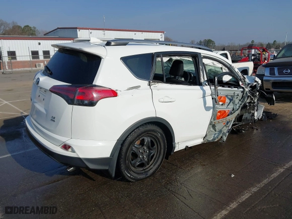 2018 Toyota RAV4 LE with VIN 2T3BFREV5JW854513, listed as a IAAI auction lot 41804823 with 138,476 mi miles. Bid and sale history available at carsss.com. Image 4.