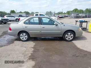2006 Nissan Sentra z VIN 3N1CC51D26L527297, wystawiony jako IAAI lot #42107478 z przebiegiem Nie podano mil oraz . Historia ofert i sprzedaży dostępna na DreamBid. Obrazek 13.