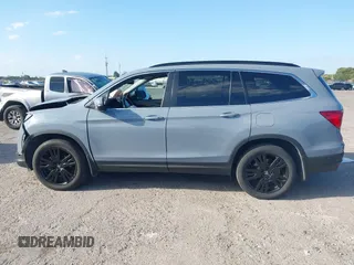 2022 Honda Pilot Special Edition with VIN 5FNYF6H29NB100195, listed as a IAAI auction lot 41716085 with 88,444 mi miles and . Bid and sale history available at DreamBid. Image 14.