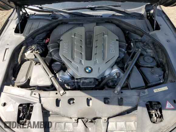 2010 BMW 7 Series 750i xDrive z VIN WBAKC6C5XACL67558, wystawiony jako Copart lot #88550755 z przebiegiem 108 796 mil mil oraz Szkoda całkowita • Salvage title. Historia ofert i sprzedaży dostępna na DreamBid. Obrazek 11.