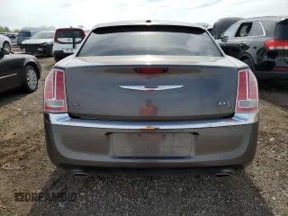 2013 Chrysler 300 C z VIN 2C3CCAKT2DH665649, wystawiony jako Copart lot #55963305 z przebiegiem 188 138 mil mil oraz Szkody całkowita. Historia ofert i sprzedaży dostępna na DreamBid. Obrazek 6.