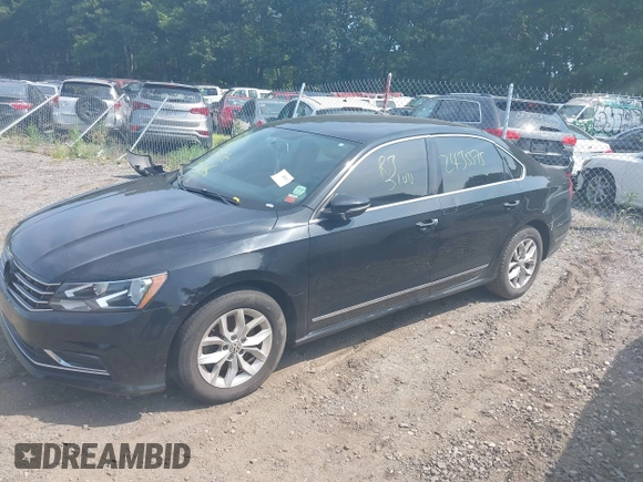 2016 Volkswagen Passat S with VIN 1VWAT7A30GC058676, listed as a IAAI auction lot 39978574 with Not provided miles and . Bid and sale history available at DreamBid. Image 2.